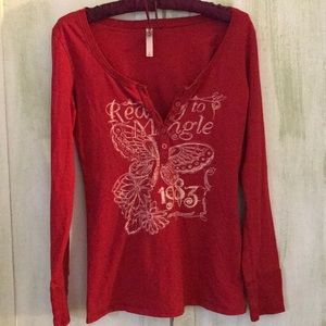 Bundle of two V-necked, vintage style tops.